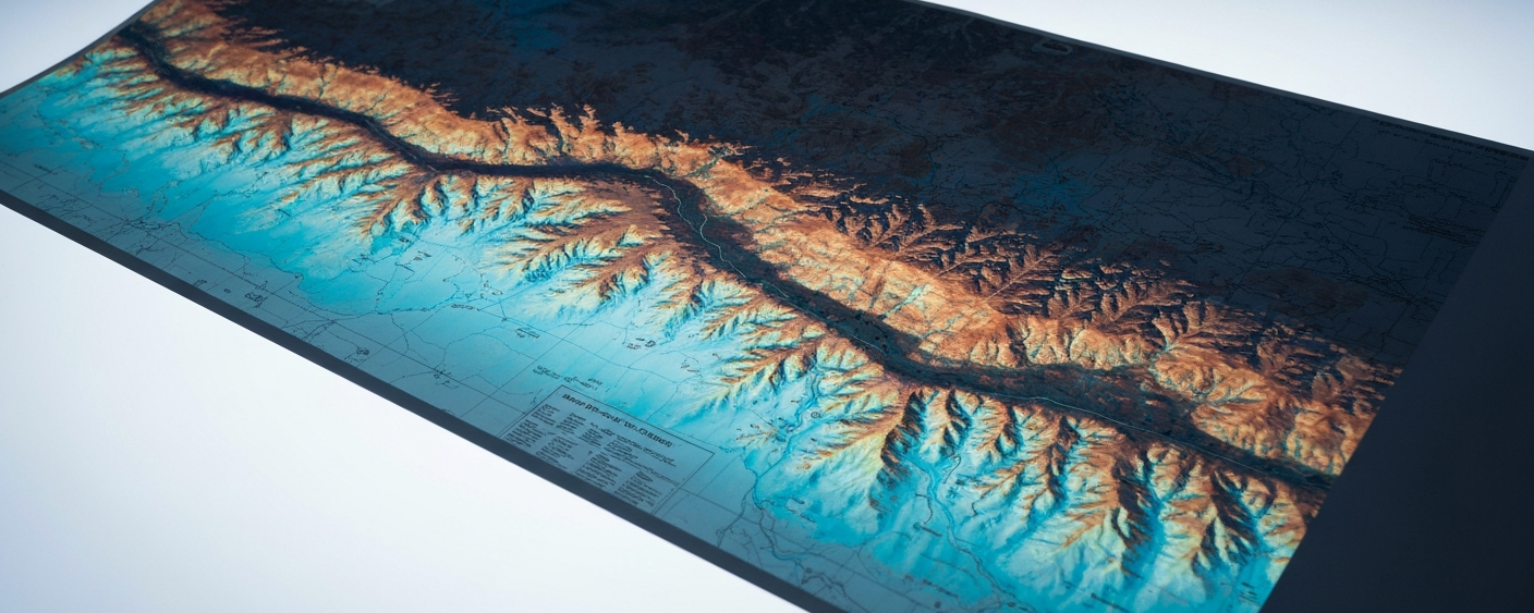 Geologische Übersichtskarte einer Arizona-Canyonregion auf einem Leuchttisch, cyan-magentafarbene Lichtreflexe